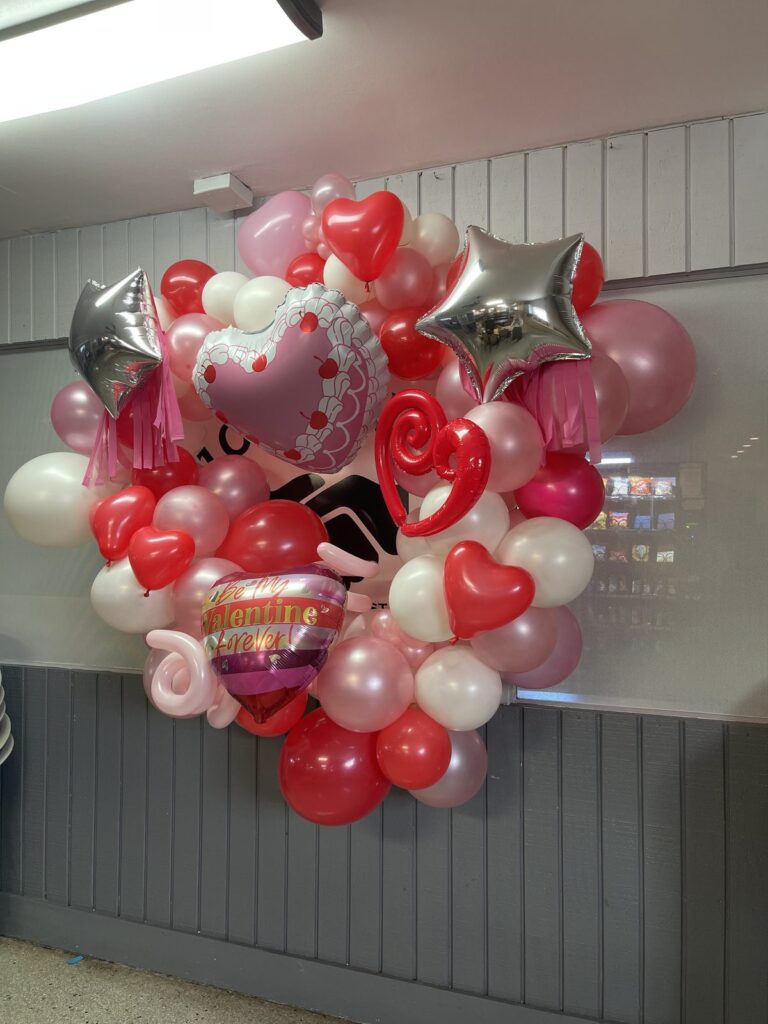 Red, pink and white Valentine balloon bouquet with heart foils